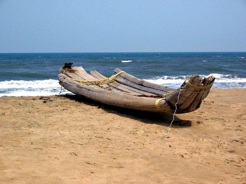 One old fishing boat with nets and other equipment in sea water